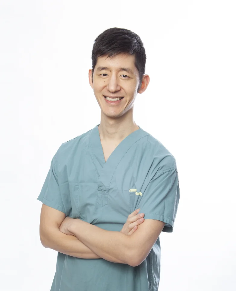 Dr. Walter Liao, MD, FRCSC, in surgical scrubs